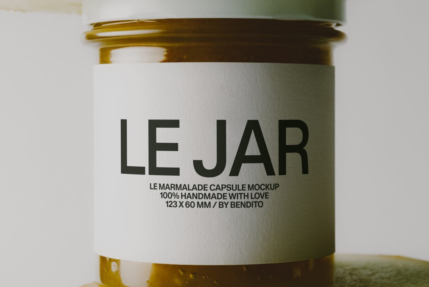 Glass jar mockup with cream label showing LE JAR branding for marmalade product