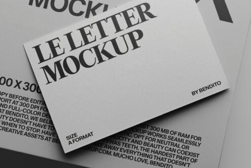 Stacked letterhead mockup with serif typography on white paper, angled view