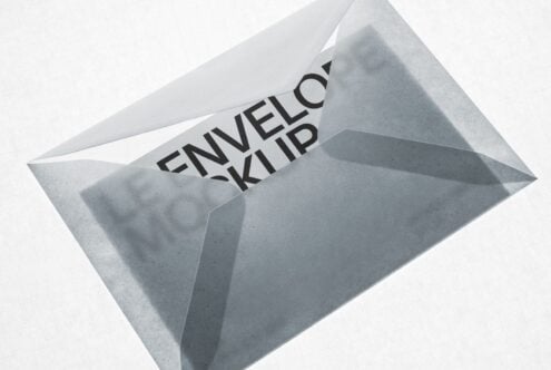 Concrete envelope mockup with bold text imprint on angled white background