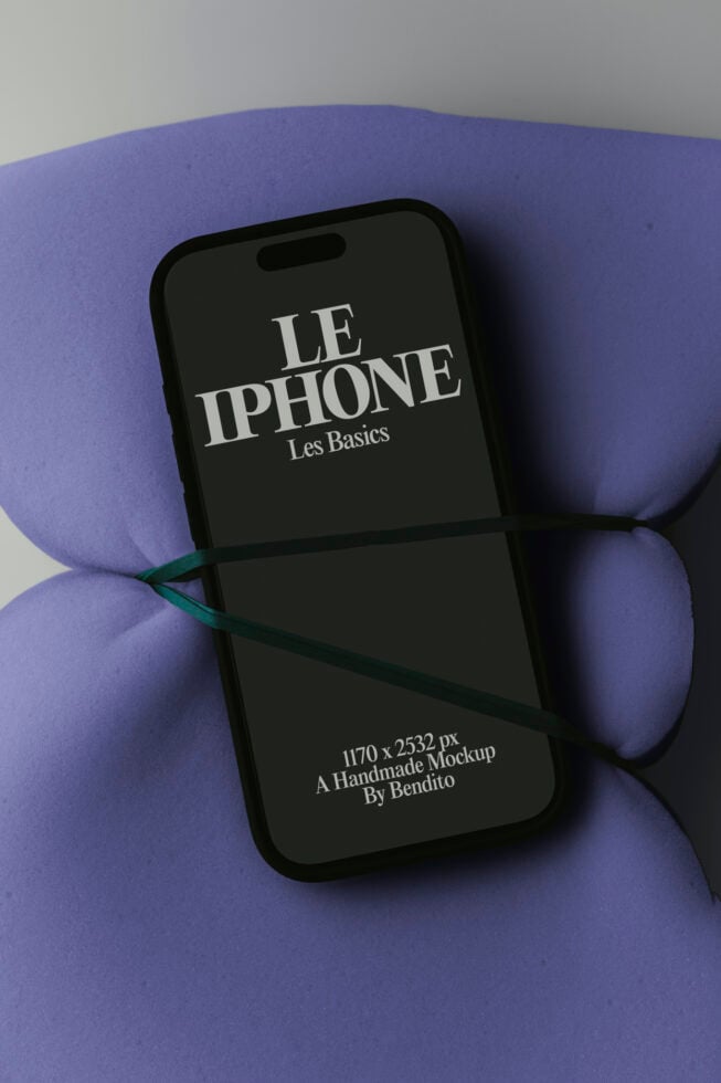 iPhone 14 mockup with serif typography on purple organic shapes, handmade by Bendito