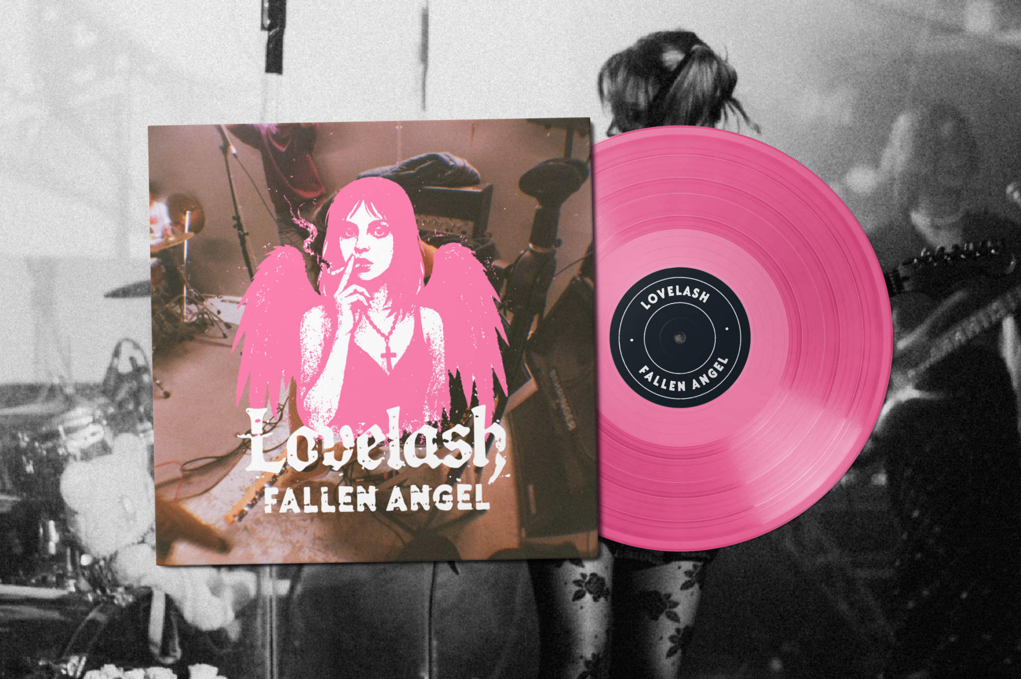 Bright pink vinyl record mockup with album cover showing neon portrait of woman, held by person in studio setting