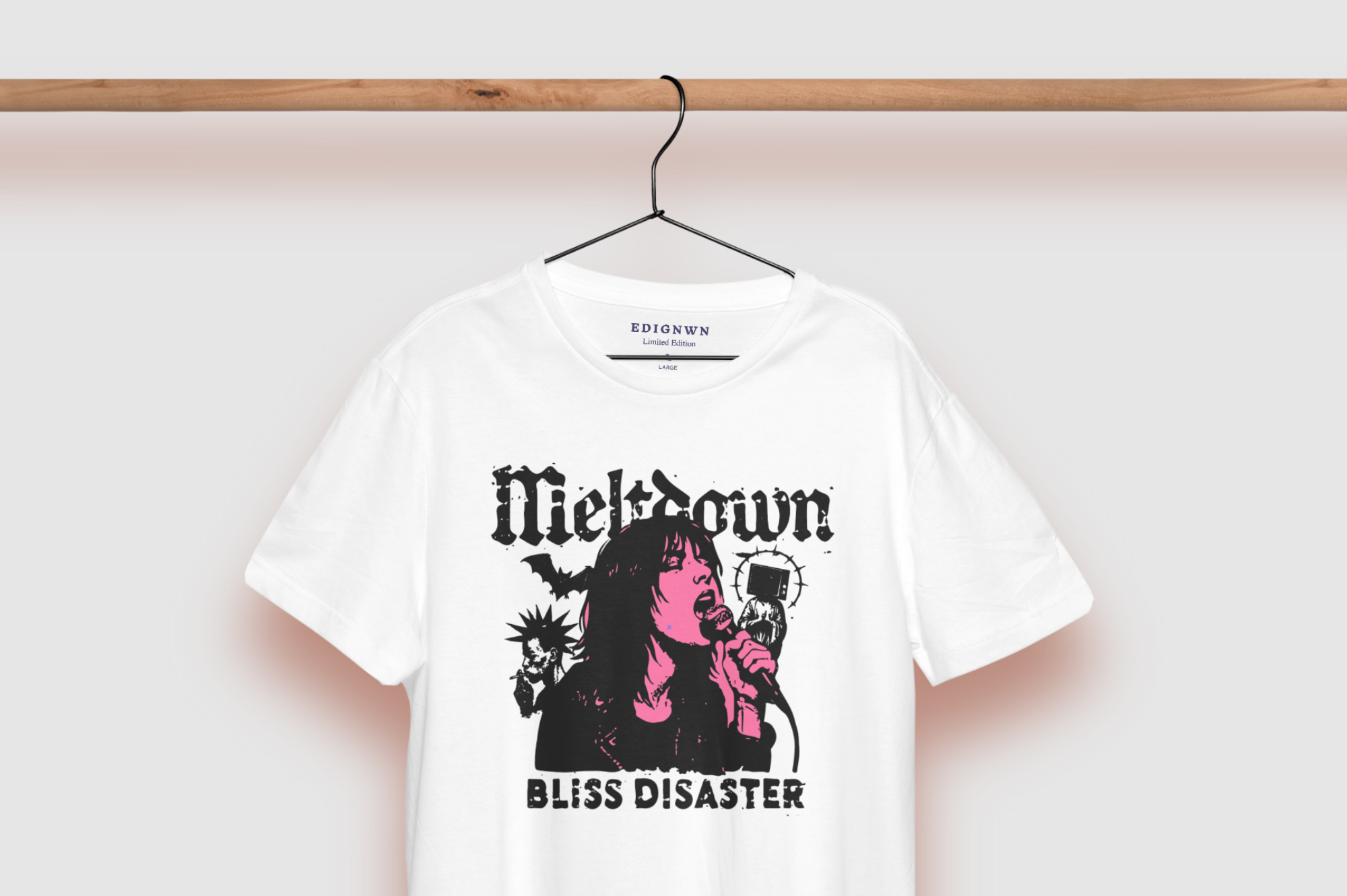 White tee on hanger with edgy band graphic, pink, black, distressed vibes
