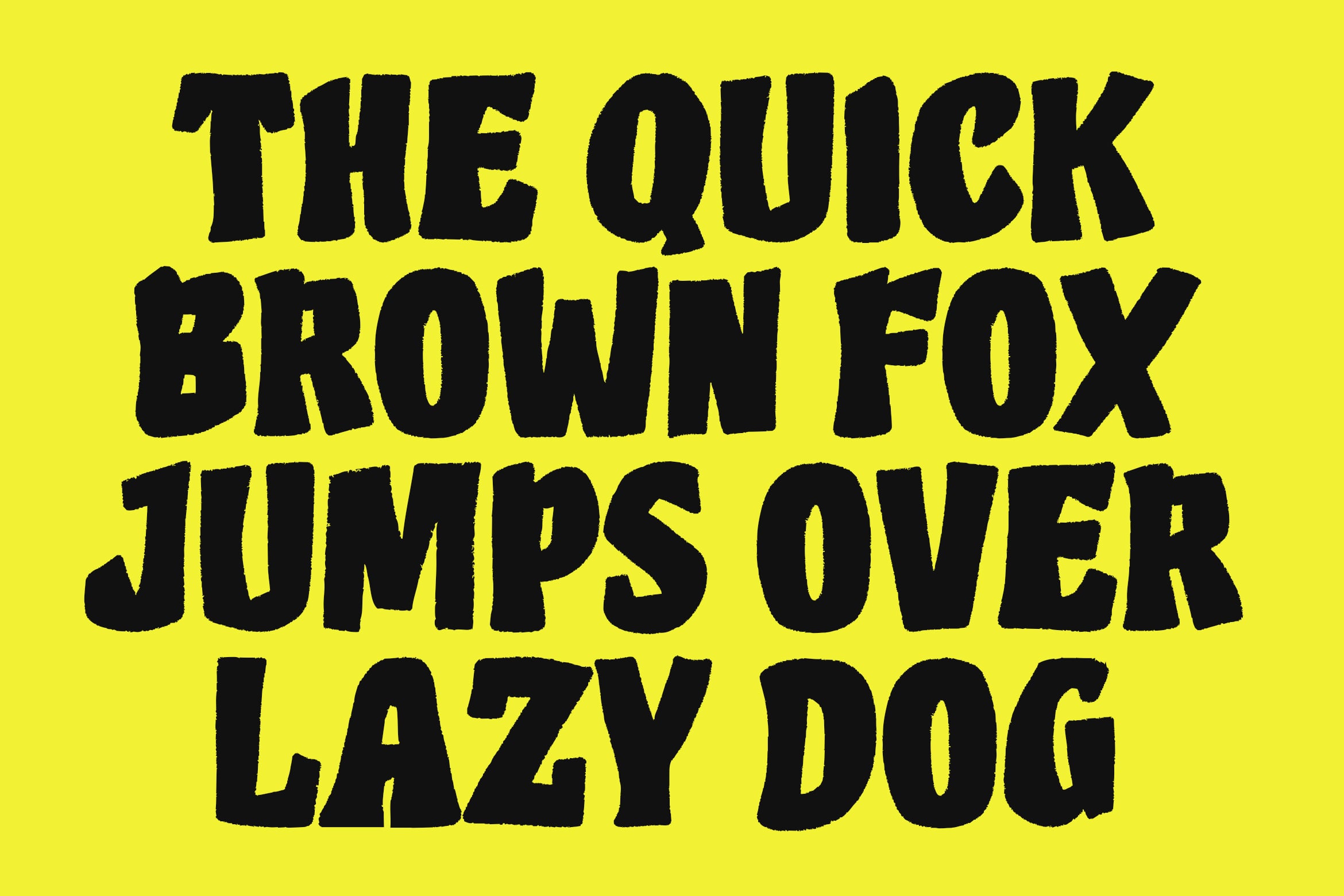 Bold black text on bright yellow background reading the quick brown fox jumps over lazy dog