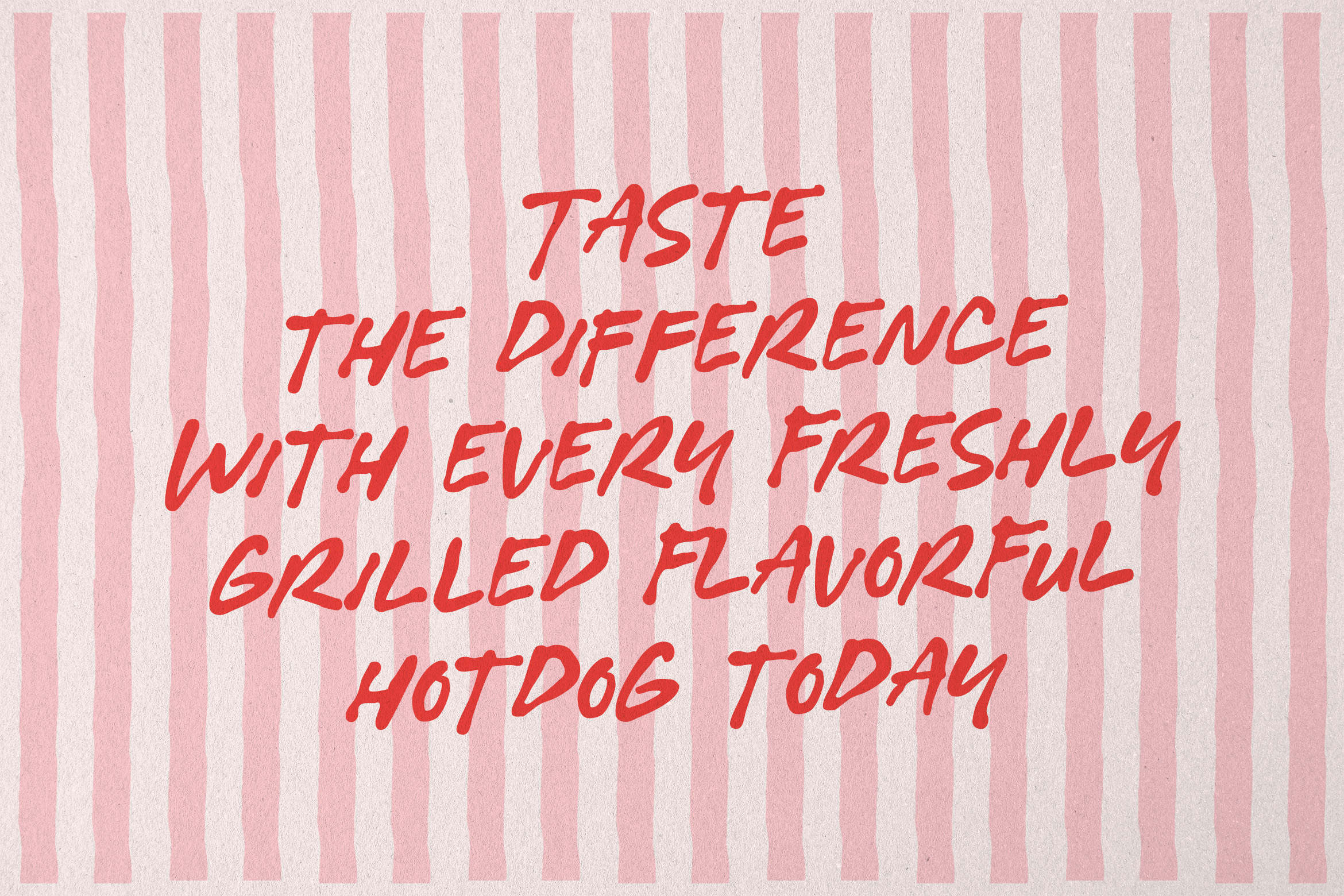 Red handwritten text on pink striped background reading "Taste the difference with every freshly grilled flavorful hotdog today"