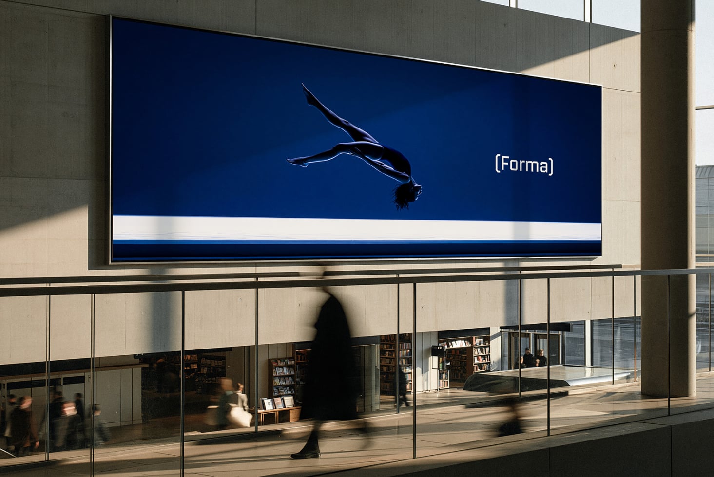 Billboard mockup showing diver silhouette on deep blue background with Forma branding