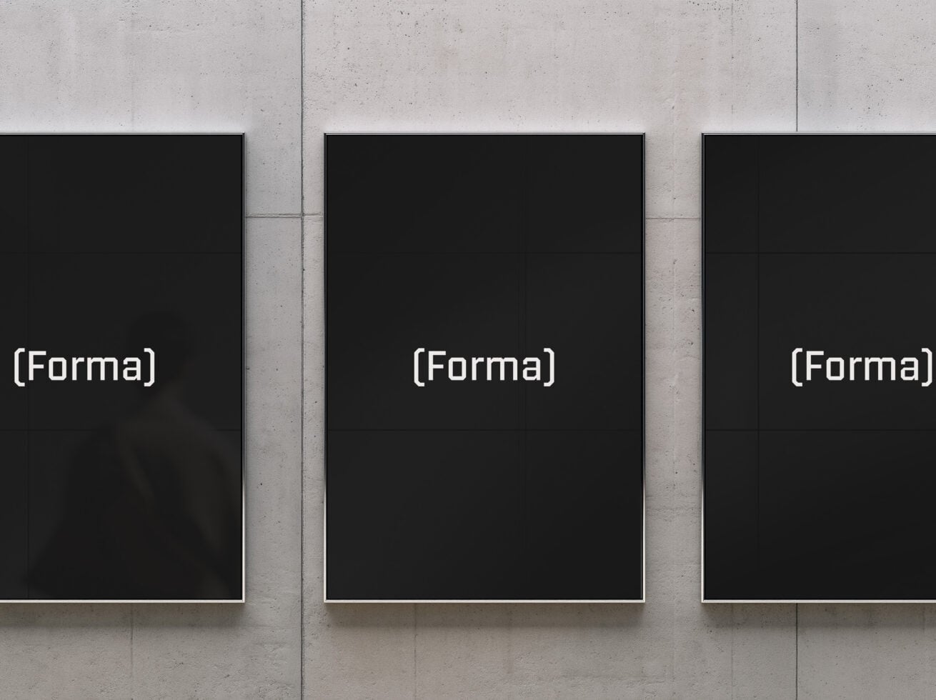 Three black framed posters on concrete wall with (Forma) branding mockup