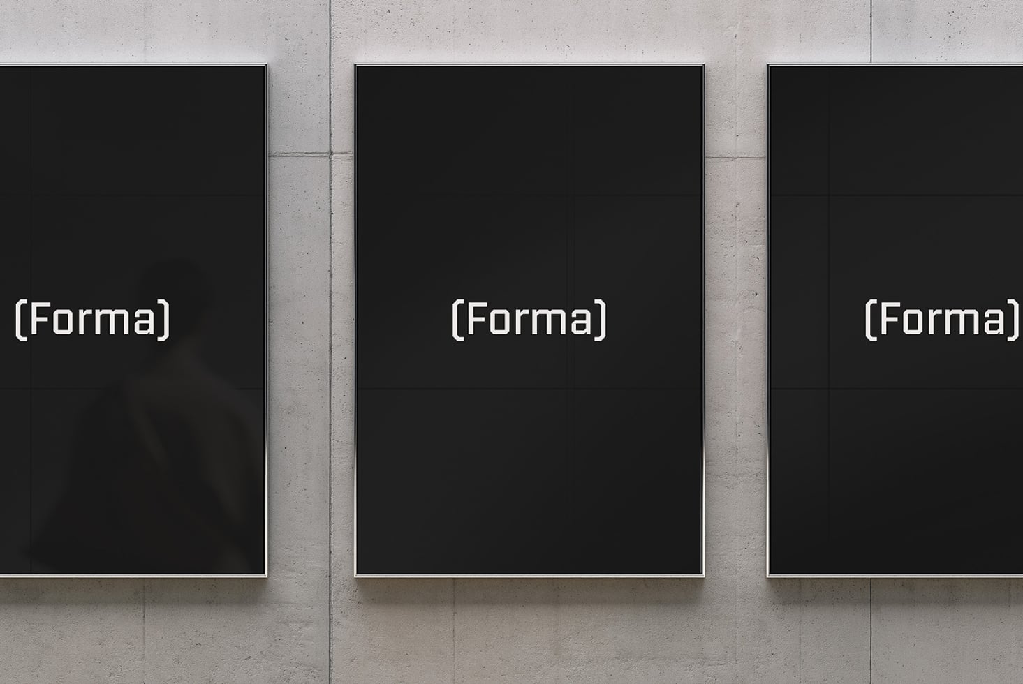 Three black framed posters on concrete wall with Forma branding mockup