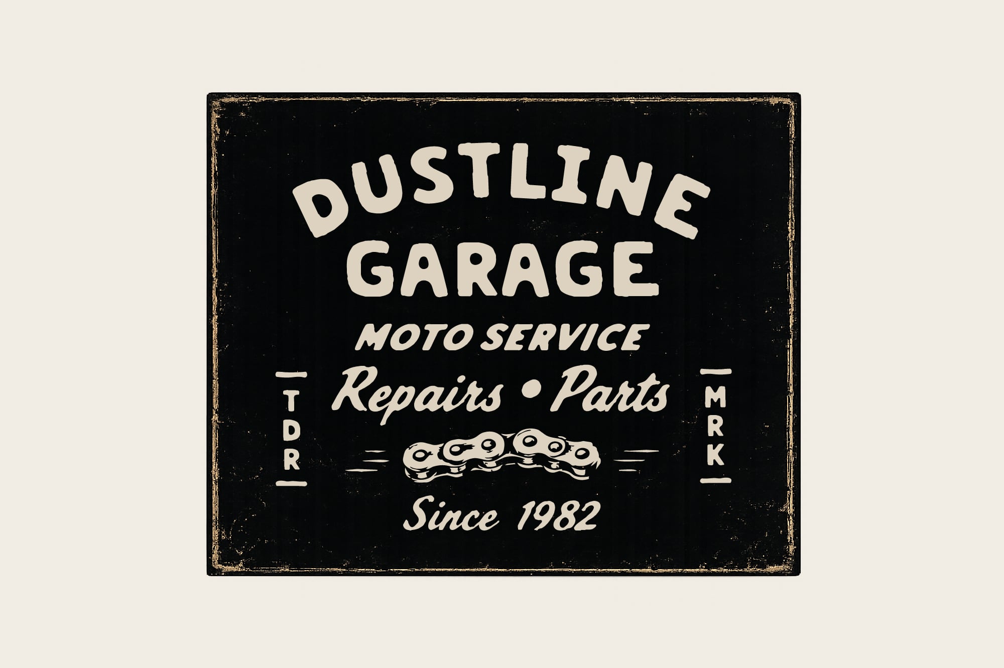 Vintage black metal sign for Dustline Garage moto service with worn gold edges