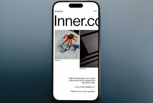 iPhone mockup showing Inner.co portfolio site with night photography grid layout on blue background