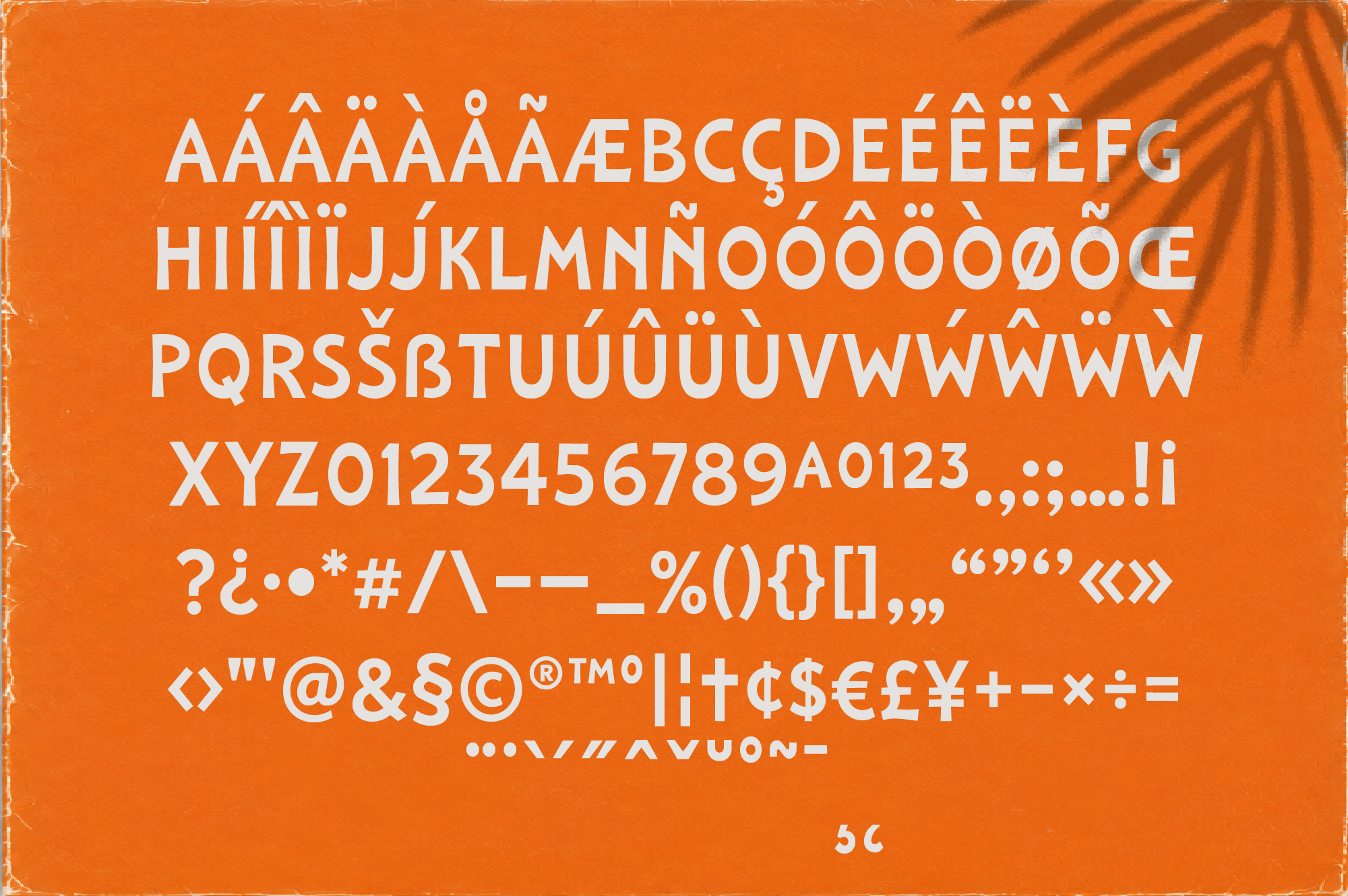 Bold sans serif font display showing full character set with accents, numbers, symbols on burnt orange background