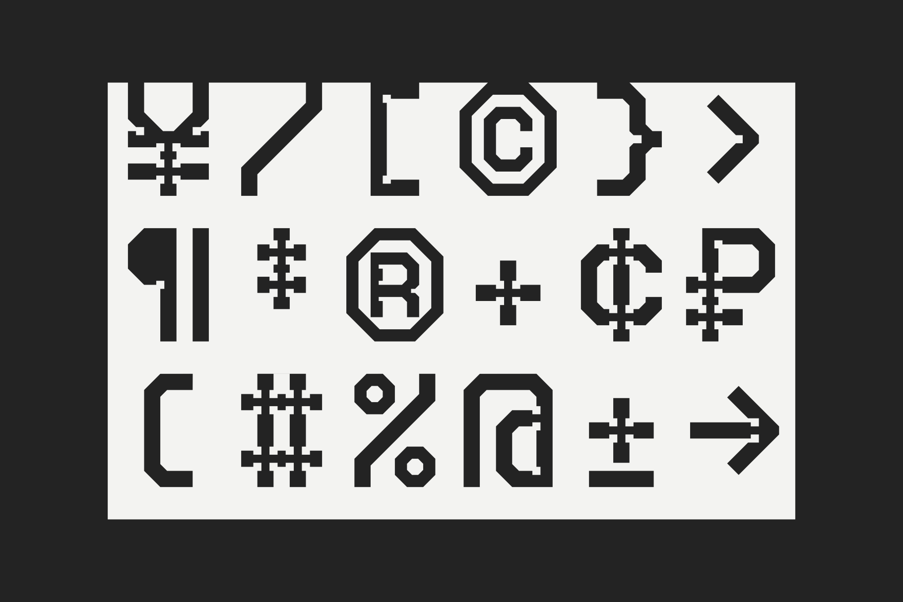 Bold geometric typeface with tech-inspired letterforms, crosses, circles, plus signs mixed throughout the character set