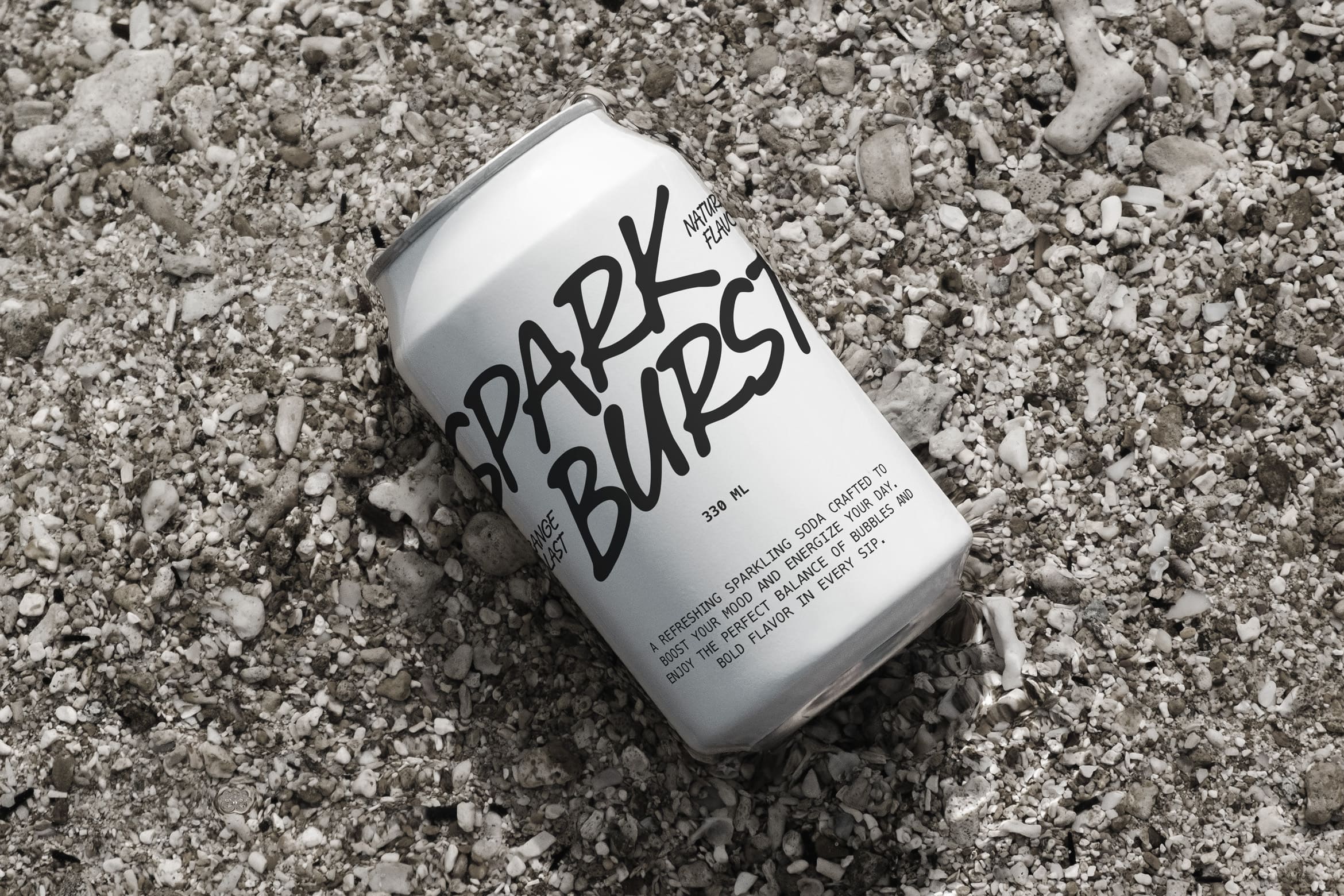 Sparkling burst soda can mockup sitting on crushed ice texture background