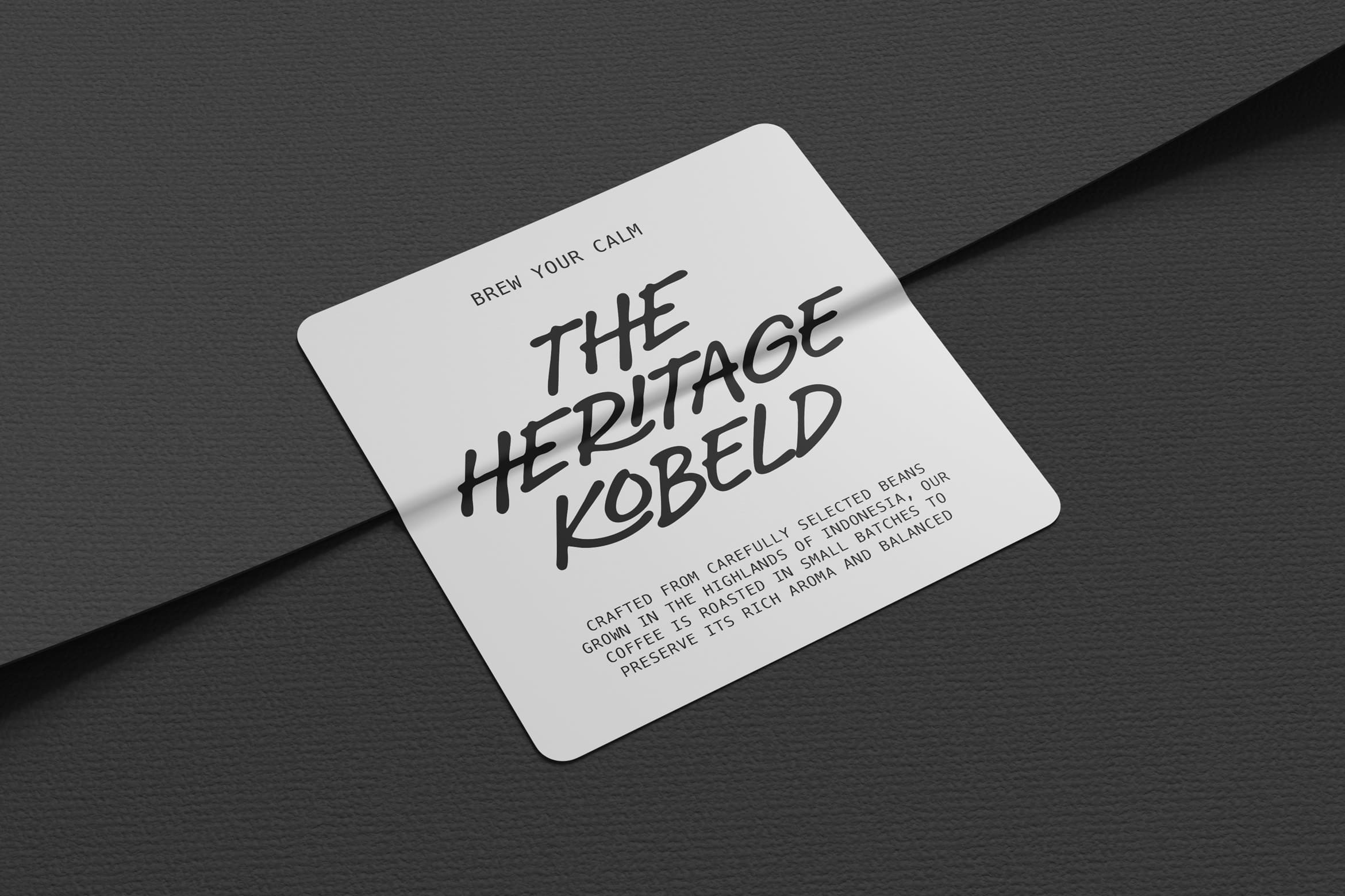 Coffee label mockup with hand-drawn typography on dark background