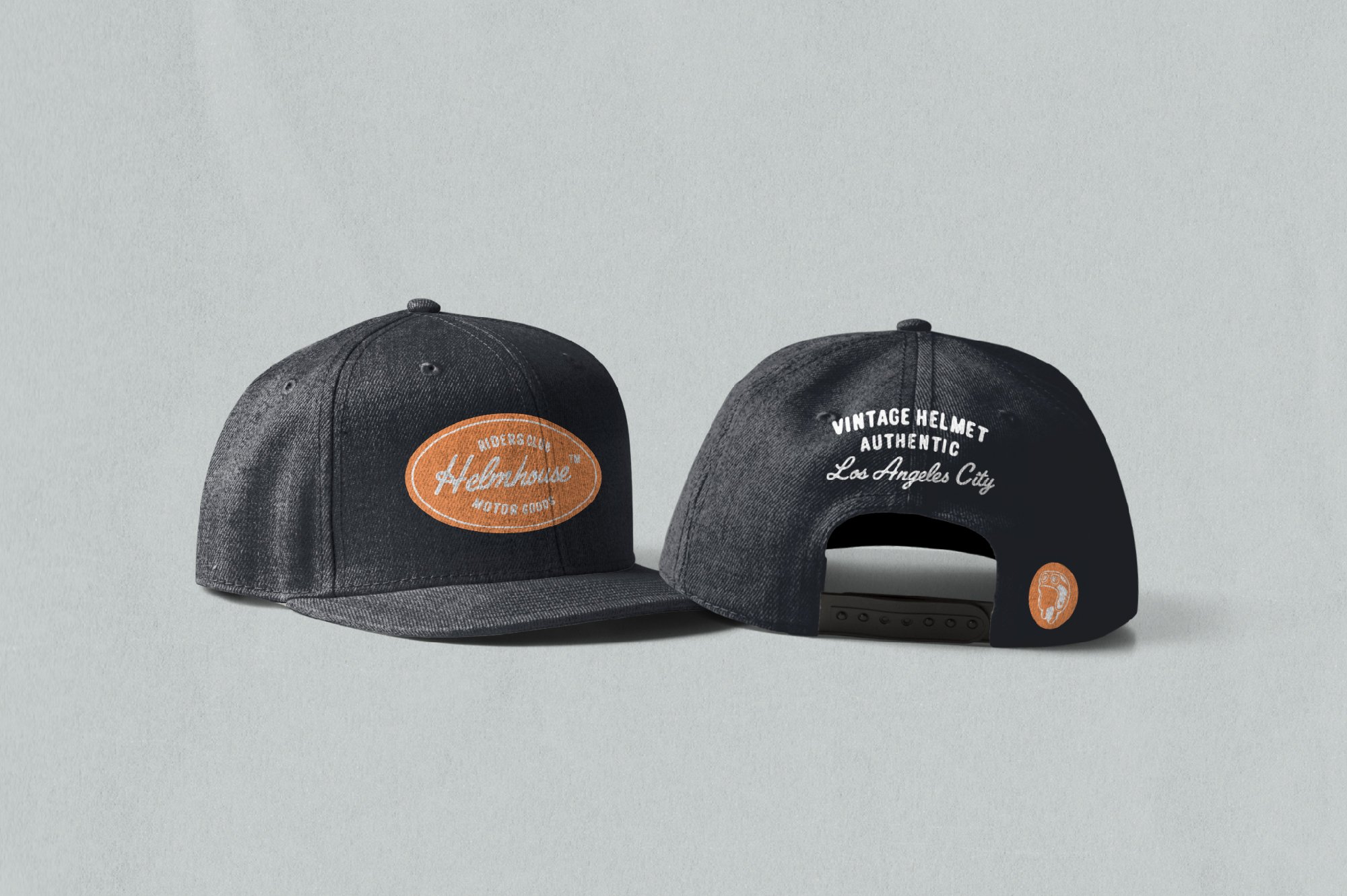 Black snapback cap mockup showing front with orange patch logo plus back with LA City text