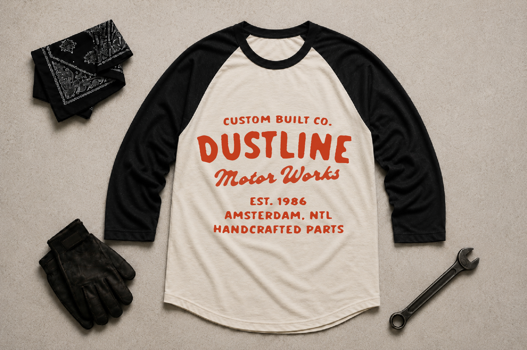 Raglan tee mockup with vintage motor shop branding, styled with bandana, leather gloves, wrench