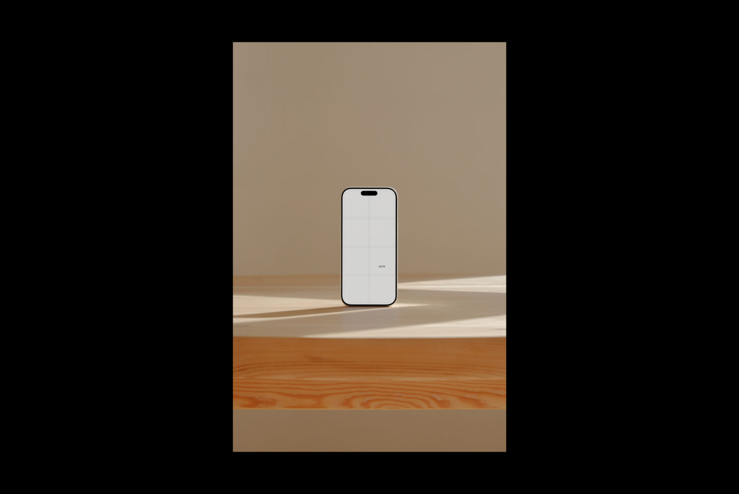 iPhone 14 Pro mockup standing on wooden floor with beige wall, natural light shadows