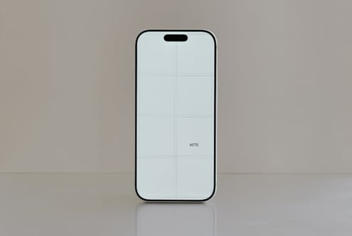 iPhone 14 Pro mockup with gridded screen on neutral grey background