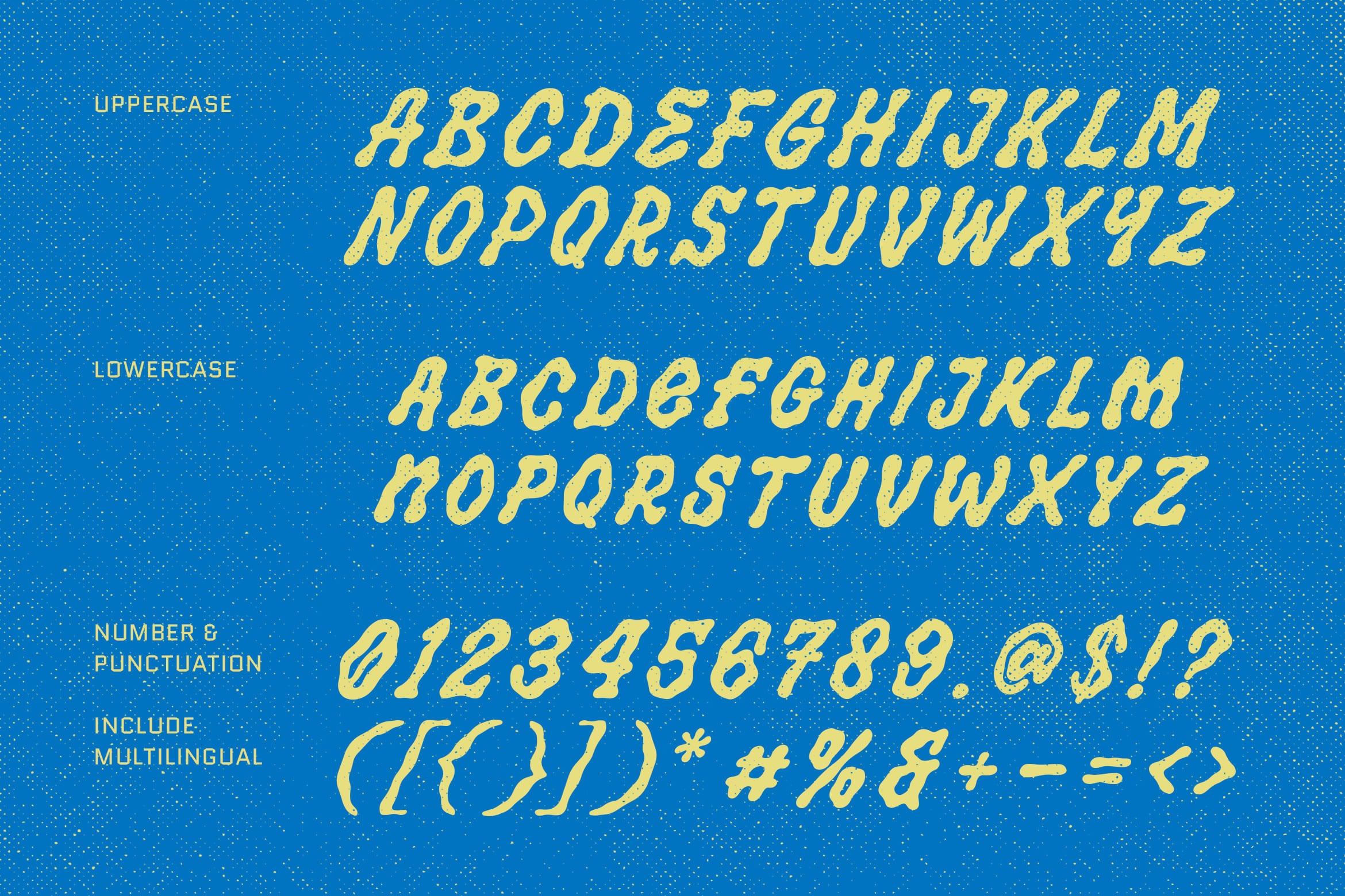 Bright yellow italic font on blue speckled background showing uppercase, lowercase, numbers, symbols with multilingual support
