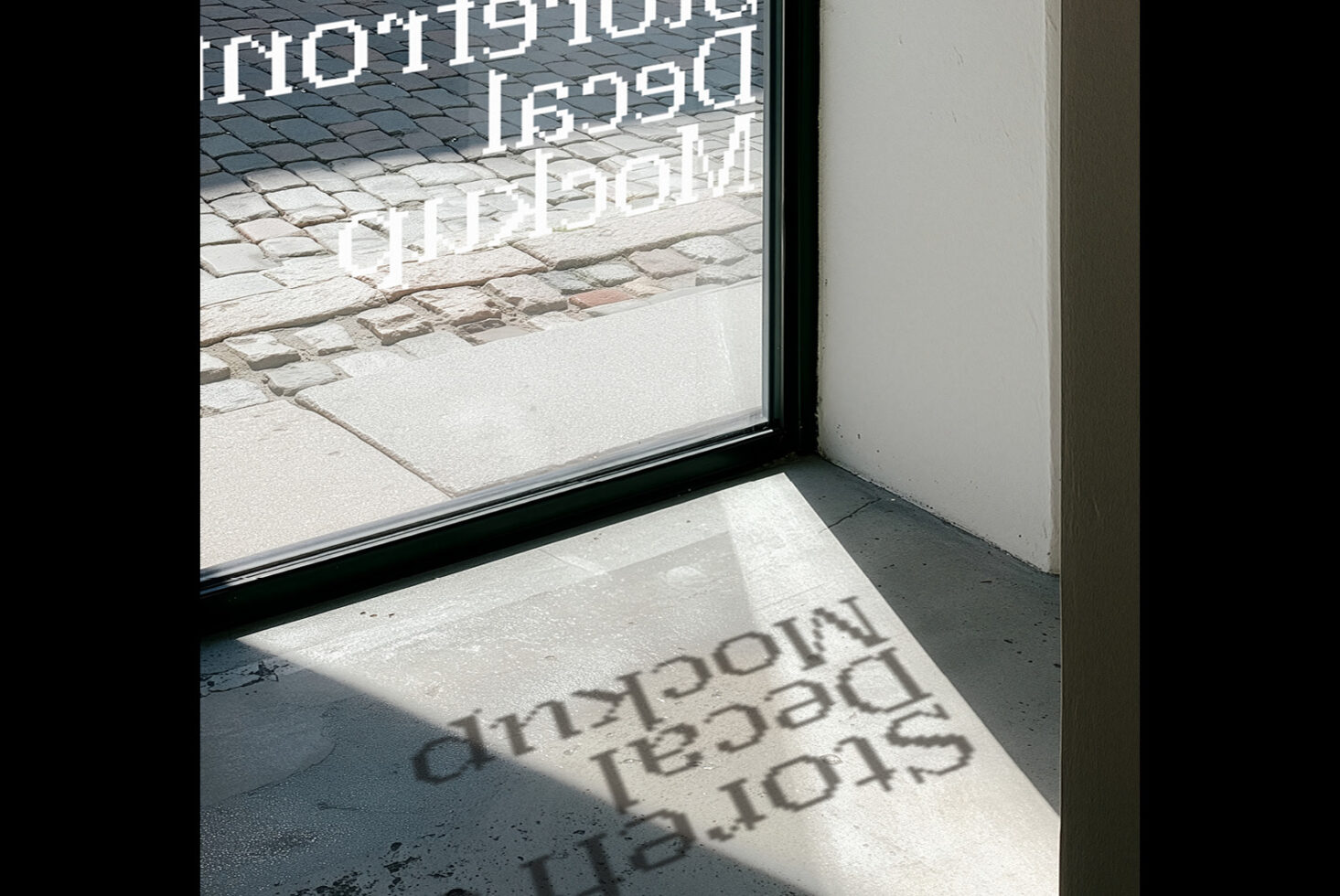 Neon sign reflecting through storefront window with shadow cast on concrete floor