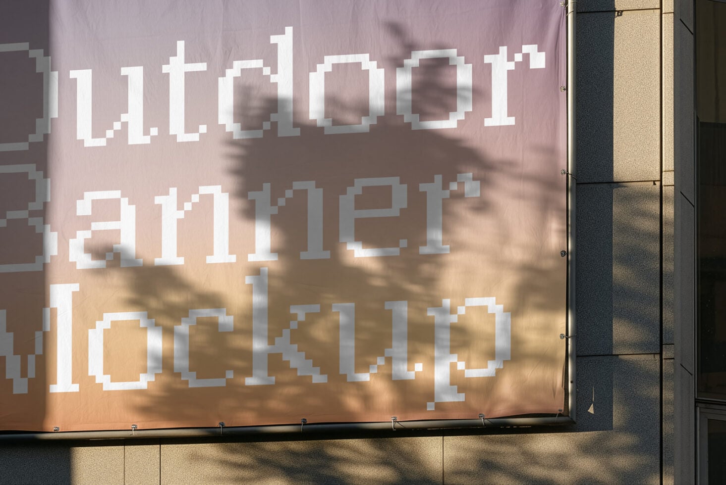 Pixelated white text on gradient banner with tree shadows cast across it