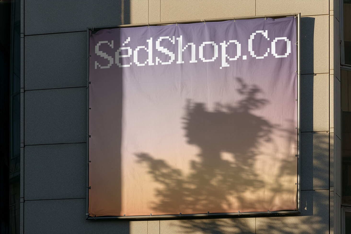 Outdoor banner mockup with pixel font text on mauve gradient fabric, tree shadows cast across surface