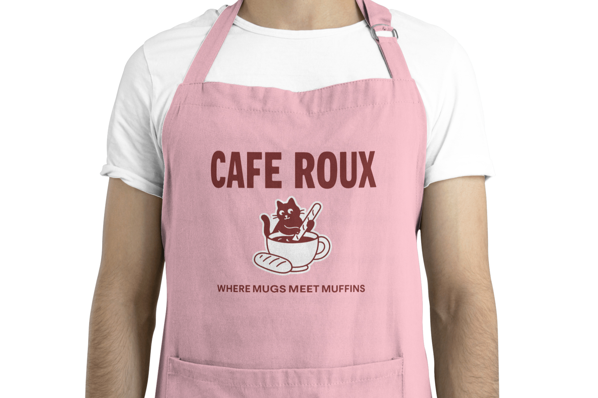 Cafe Roux apron mockup with pink fabric, cat in coffee cup graphic, where mugs meet muffins