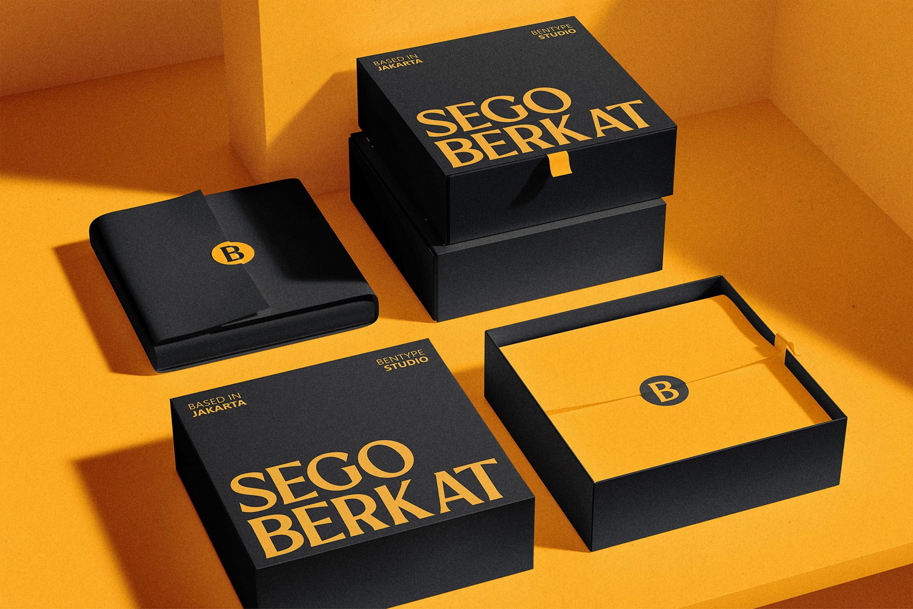 Black boxes with gold branding mockup on bright yellow background
