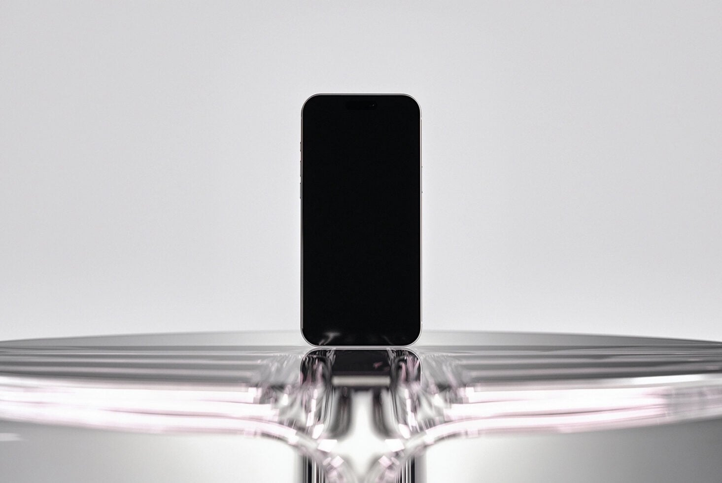 Black iPhone mockup emerging from liquid metal splash on gray backdrop