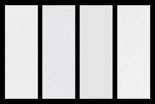 Four tall vertical paper textures with subtle grain on black background