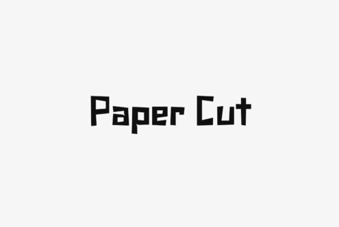 Paper Cut typeface with chunky geometric letterforms on light background