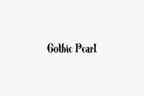 Gothic Pearl serif typeface with ornate decorative details on light background