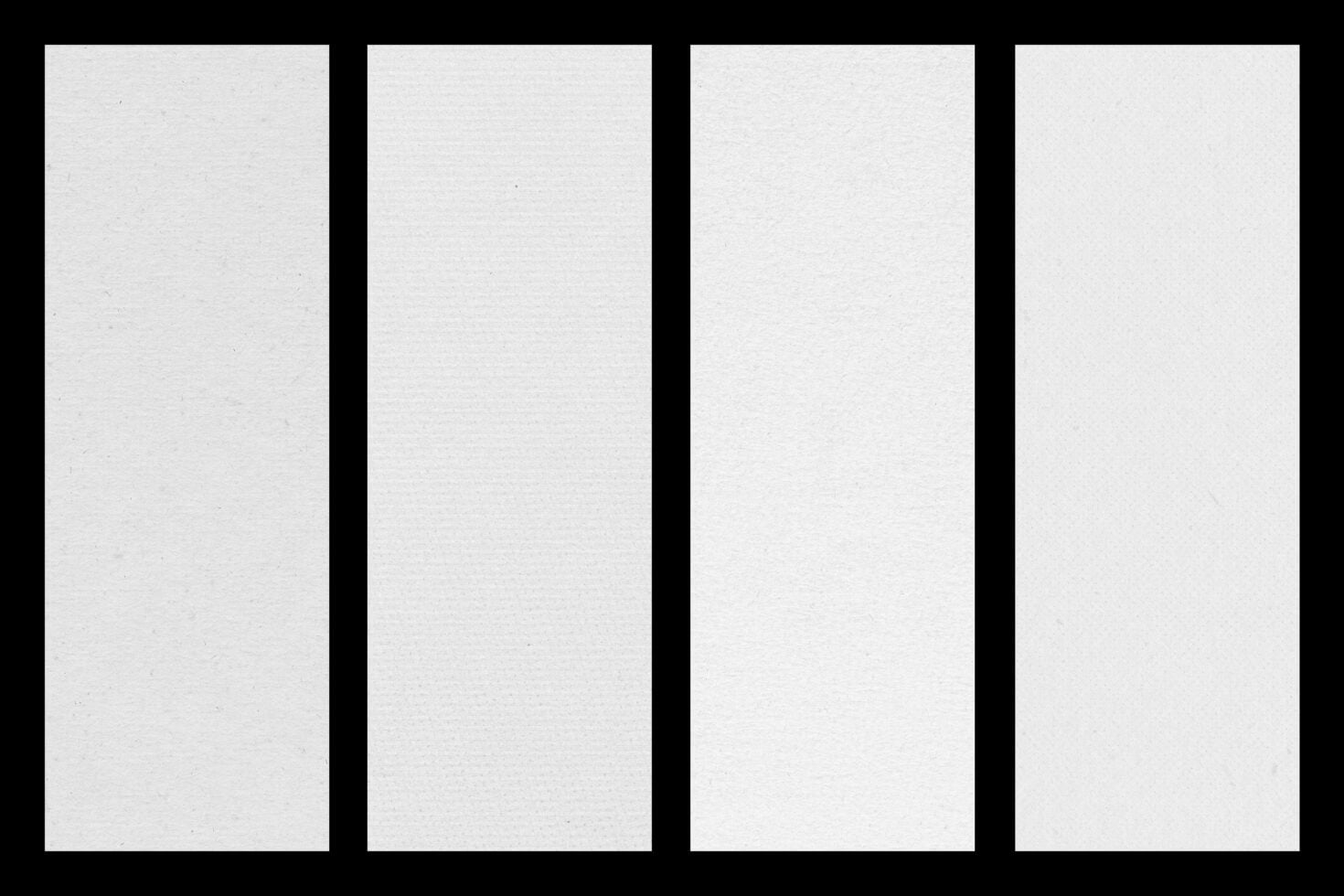 Four tall blank paper mockups with subtle texture on black background