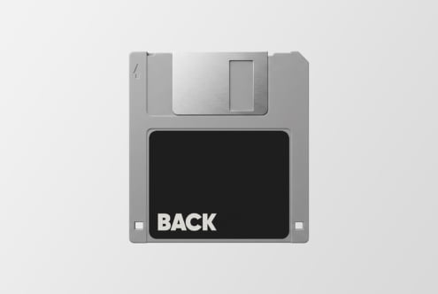 Retro floppy disk mockup with silver casing, black label showing back side view