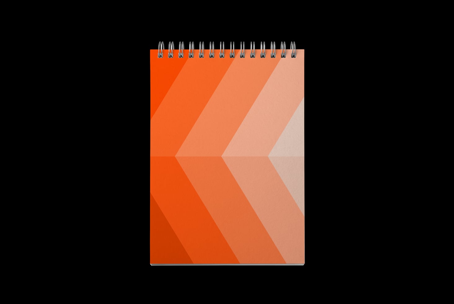 Spiral notebook mockup with orange gradient chevron stripes on black background