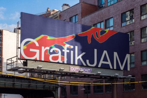 Colorful street art billboard with "Grafik JAM" text, red hand graphic, neon rainbow accents on urban building
