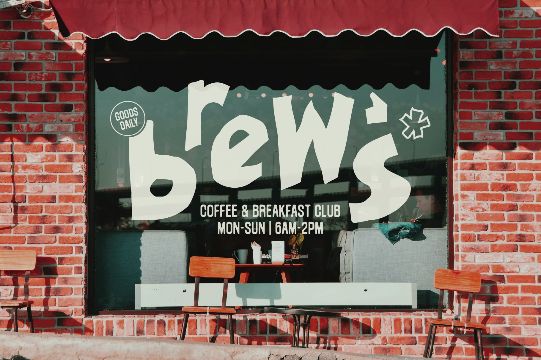 Storefront mockup showing cafe window display with bold "SEWS" lettering, red awning, teal interior, mid-century seating