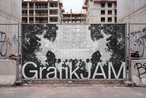 Construction site barrier with tree silhouettes, bold typography, urban grit vibes