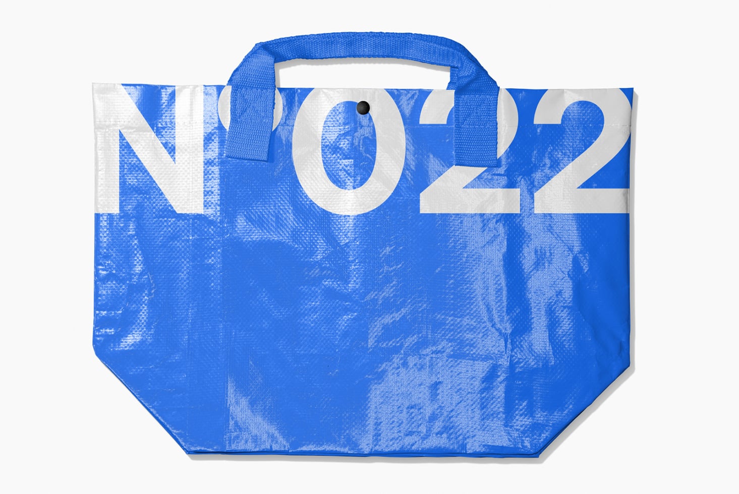 Blue plastic tote bag mockup with large white numbers, textured fabric surface