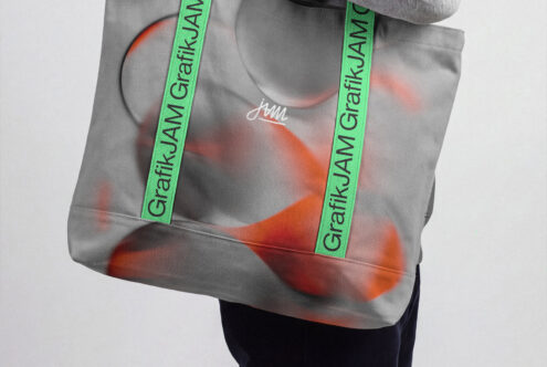 Gray tote bag with neon green straps, orange abstract print, custom branding mockup