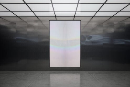 Framed portrait display on dark gallery wall with iridescent scan effect