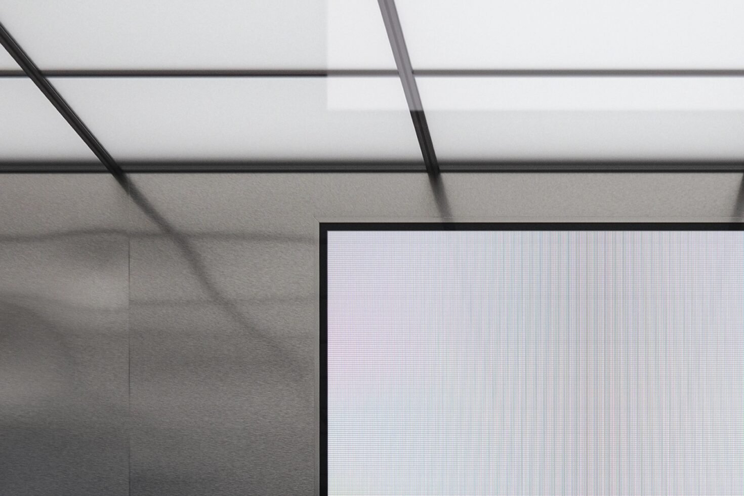 Minimalist monitor mockup mounted on concrete wall with geometric shadows