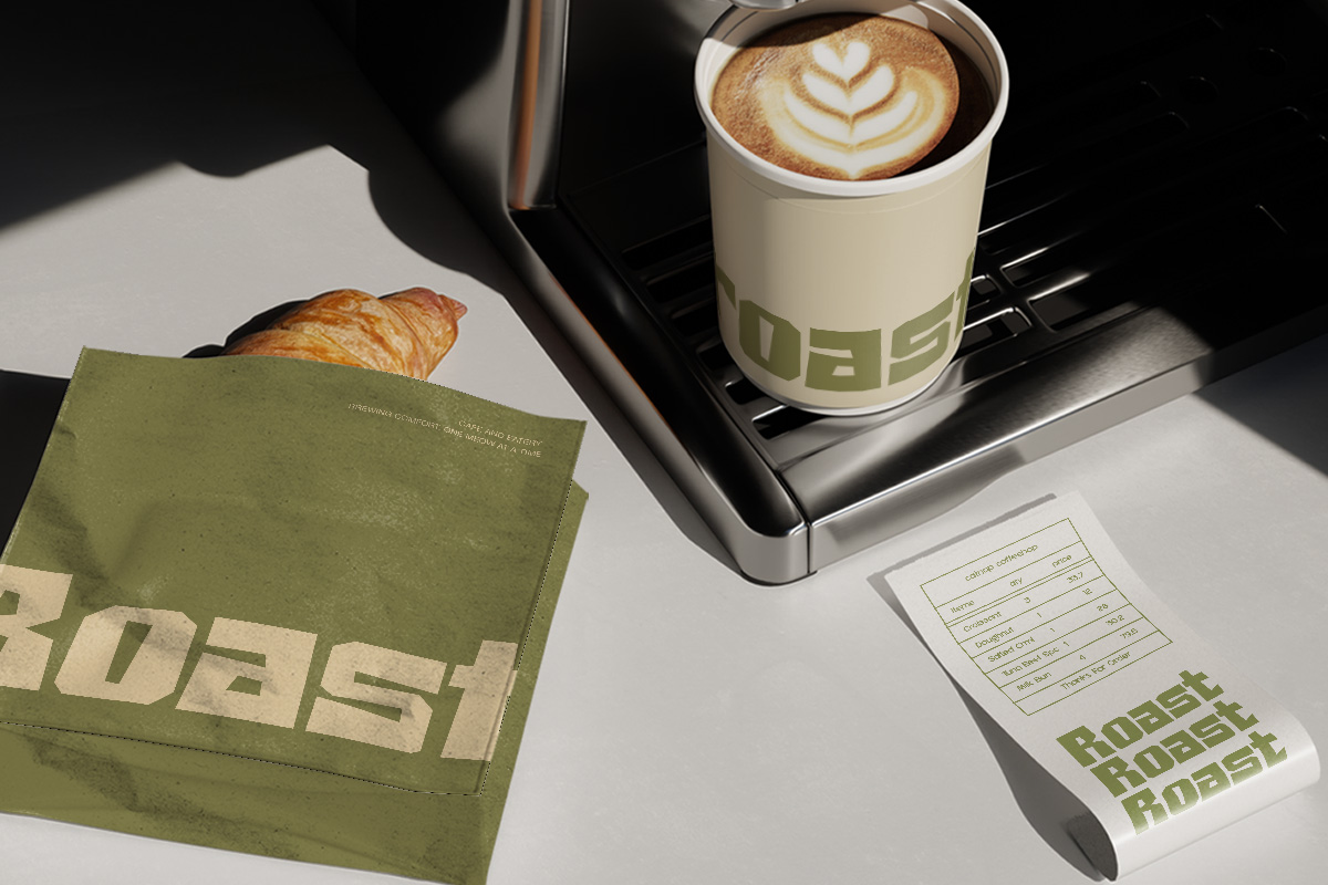 Coffee shop branding mockup with cup, napkin, receipt, plus croissant on marble table