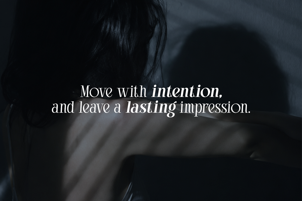 Dark moody typography overlay with serif font on blurred figure background