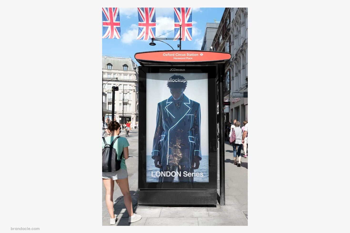 London bus shelter mockup at Oxford Circus station with Union Jack flags overhead