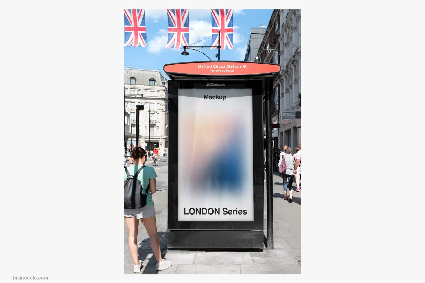 Bus shelter ad mockup at Oxford Circus with Union Jack flags, London street scene
