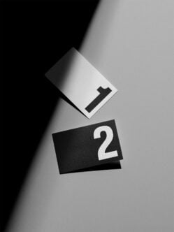 Minimalist numbered cards with bold typography on high contrast background