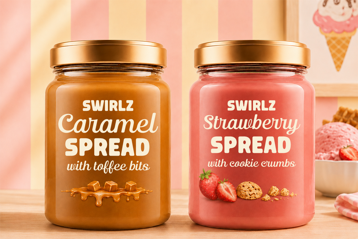 Caramel toffee spread jar next to strawberry cookie spread jar on wooden surface