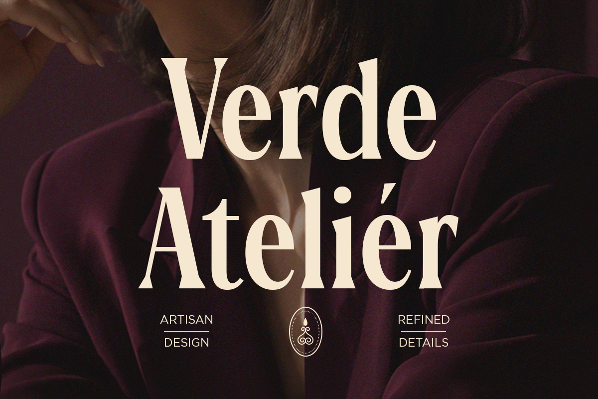 Verde Atelier serif font with cream lettering over moody burgundy velvet texture