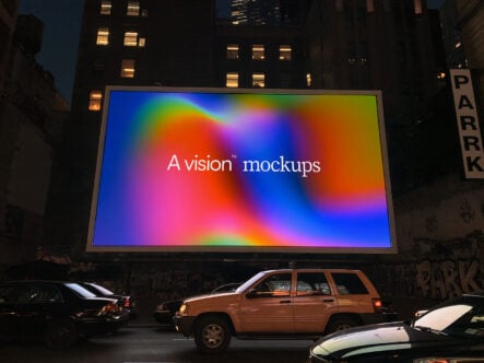 Vibrant gradient billboard mockup at night with colorful rainbow display in urban street setting
