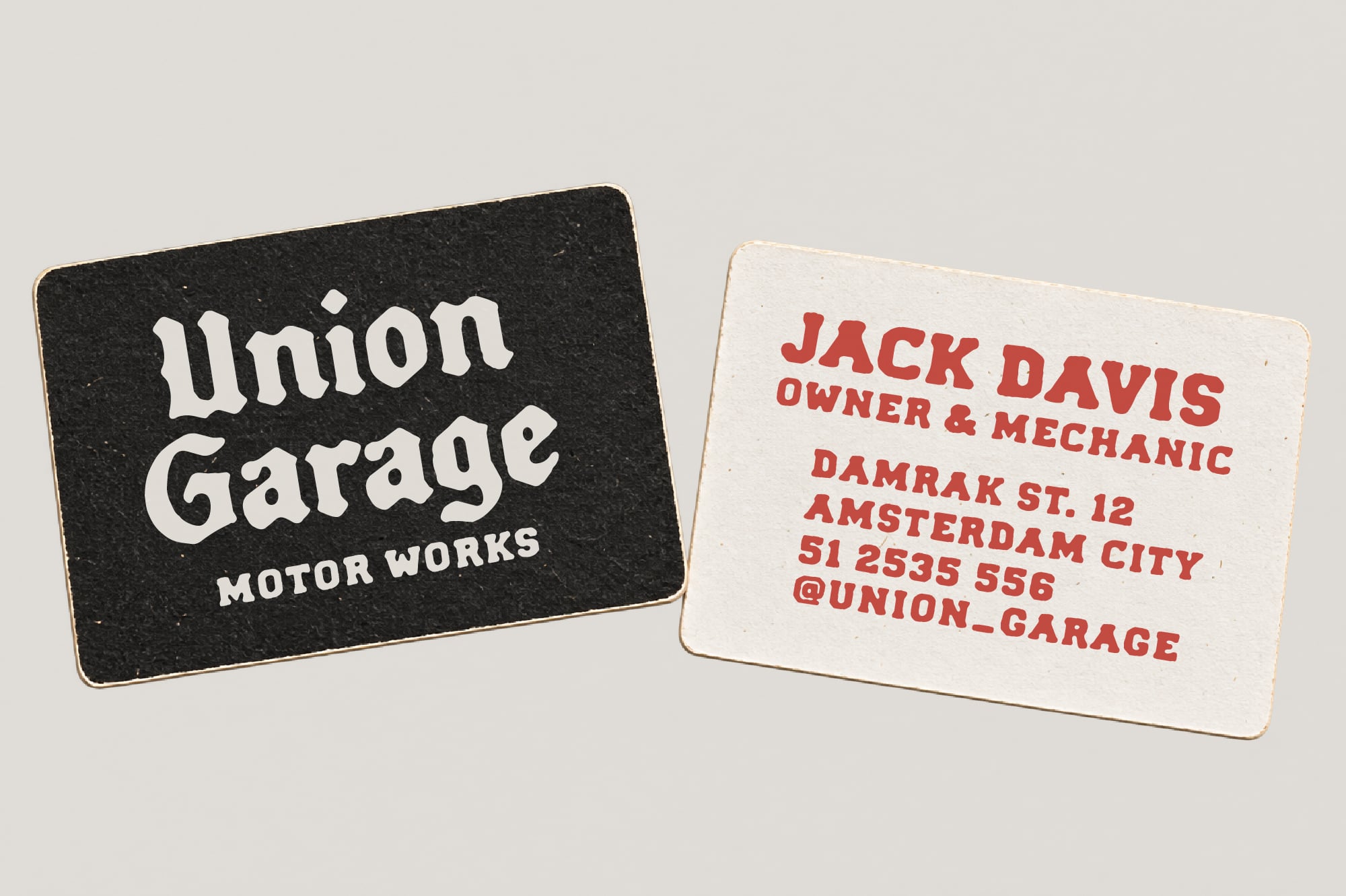 Vintage business cards for Union Garage Motor Works with black, cream, red type